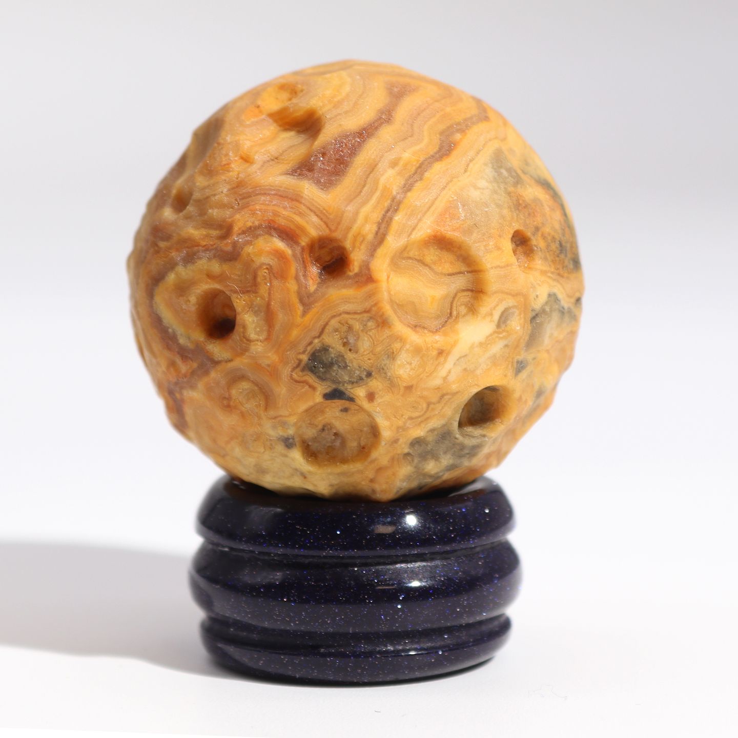 Gemstone Planets on a Goldstone Stand