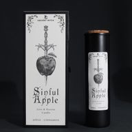 Sinful Apple ritual candle and athame-pierced apple gift box on a black background