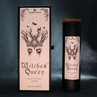 Witches’ Queen ritual candle displayed with its illustrated packaging