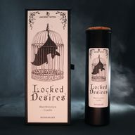 Locked Desires ritual candle displayed with its illustrated packaging